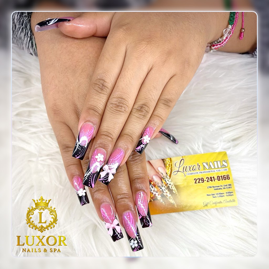 Luxor Nails & Spa logo